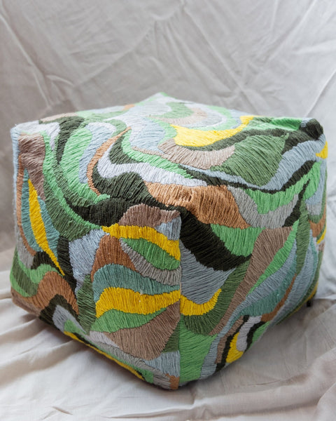 https://www.yayaandco.com/cdn/shop/products/lucky-organic-cotton-abstract-pouf-693869_grande.jpg?v=1694249961